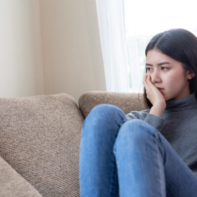 体調不良の女性